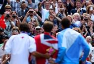 Roger Federer (L) and Juan Martin del Potro (R) at the London 2012 medal ceremony